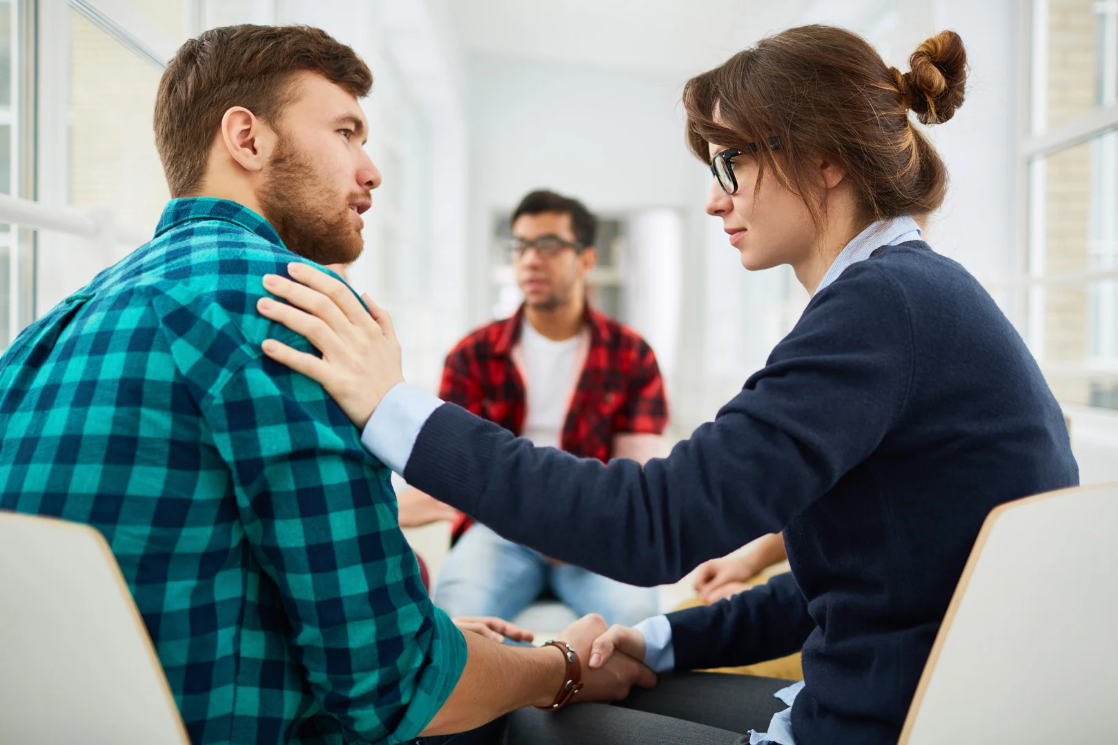 Therapist Facilitating Group Therapy